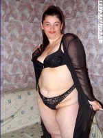 Kinky mature plumper stripping in black lingerie