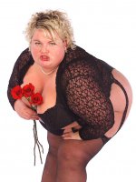 Stunning bbw milf having some fun with some roses on her hot naked body