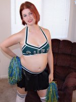 Sexy plump cheerleader gets nude and masturbates